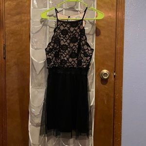 Black and cream colored dress